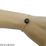 Bracelet en acier inoxydable doré et sa perle d'obsidienne dorée 10mm