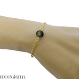 Bracelet en acier inoxydable doré et sa perle d'obsidienne dorée 8mm
