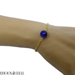 Bracelet à chaîne dorée en acier inoxydable et sa perle d'oeil de tigre bleu 10mm 