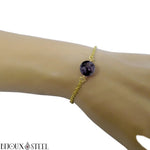 Bracelet en acier inoxydable doré et sa perle de gabbro merlinite 10mm
