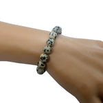 Bracelet en perles de jaspe dalmatien 10mm en pierre naturelle sur fil élastique fait main