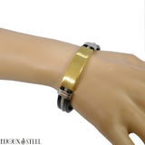 Bracelet homme à plaque acier dorée en caoutchouc noir et acier inoxydable