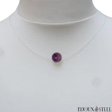 Collier fil de nylon translucide et sa perle de fluorite violette 8mm en pierre naturelle