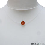 Collier fil de nylon translucide et sa perle de jaspe rouge 8mm en pierre naturelle
