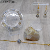 Parure dorée boucles d'oreilles pendantes et bracelets de perles en agate grise pierre naturelle